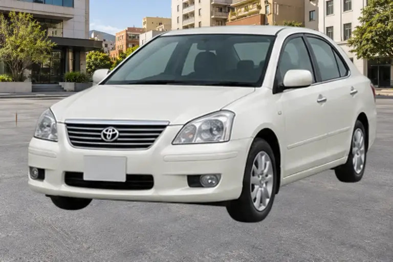 Imagen referencial de Toyota Premio, año 2005, diseño 2005–2006, color Blanco perla aproximado. No es una fotografía del vehículo rematado.